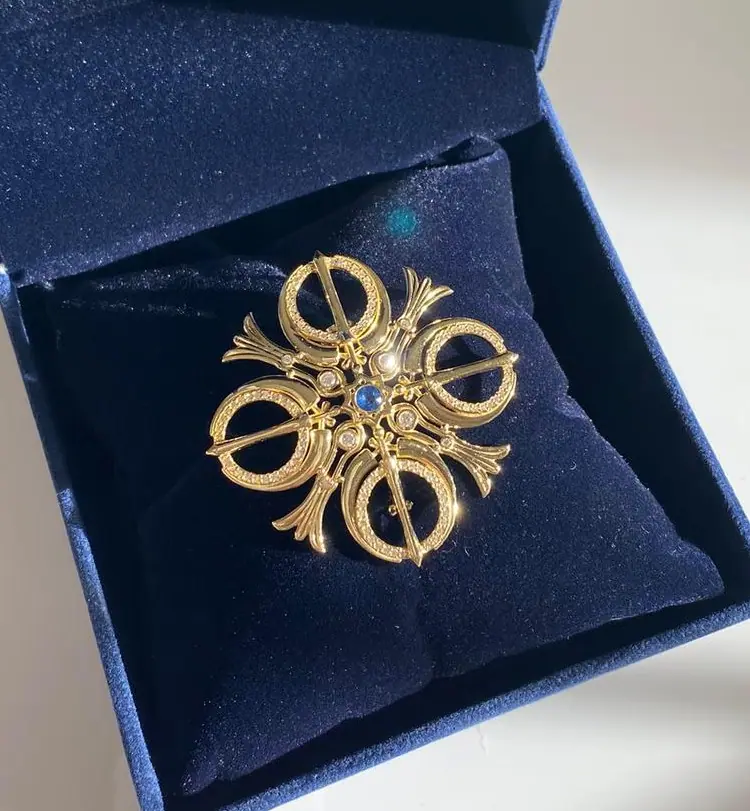 Finished Adi Shakti brooch in a blue velvet gift box