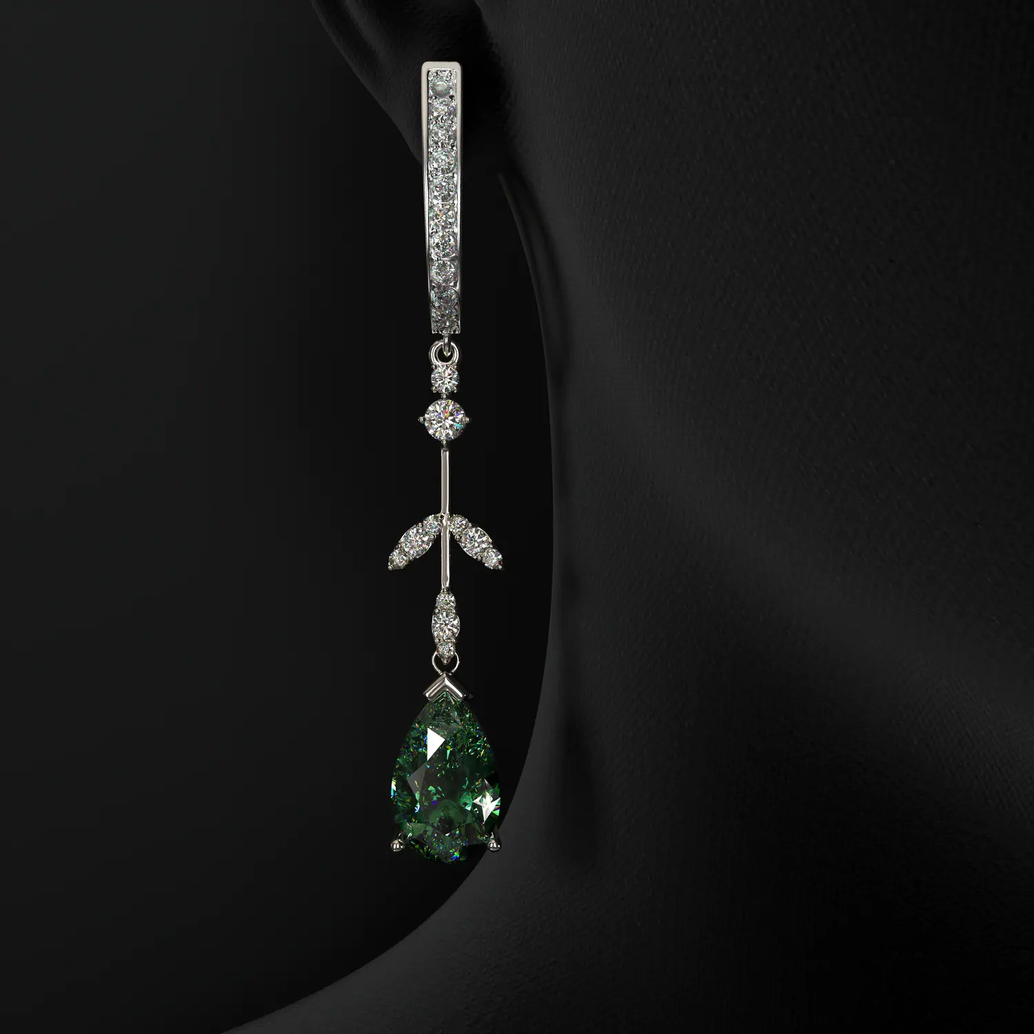 Diamond drop earring with a green pear-shaped stone
