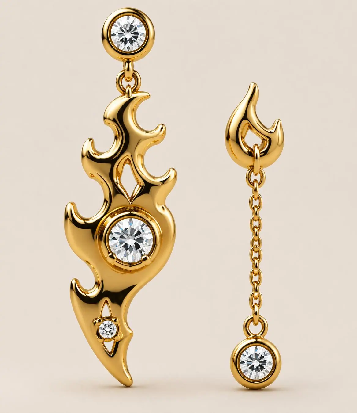 Asymmetric gold flame earrings with diamonds