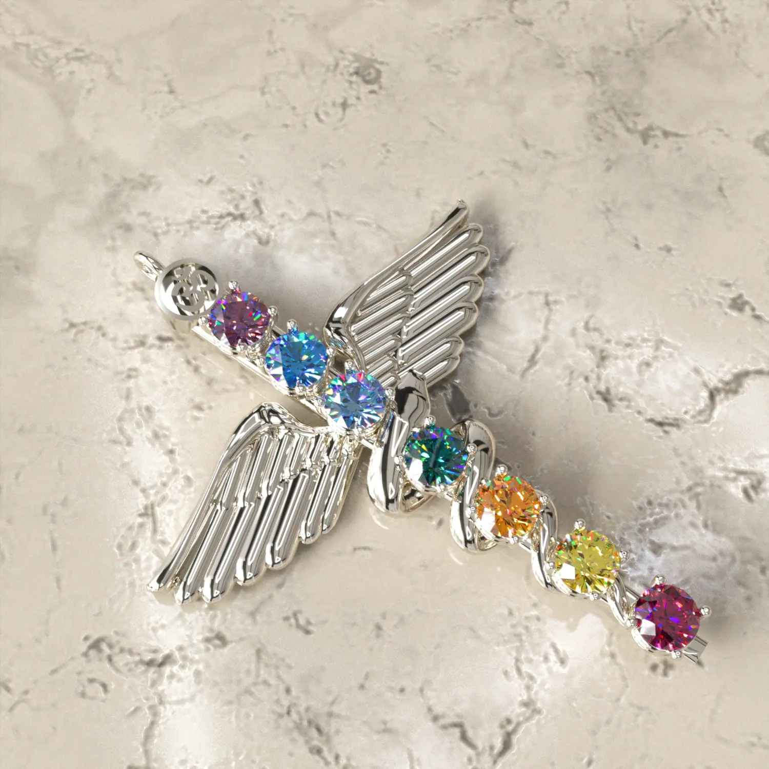 Winged pendant set with rainbow gemstones
