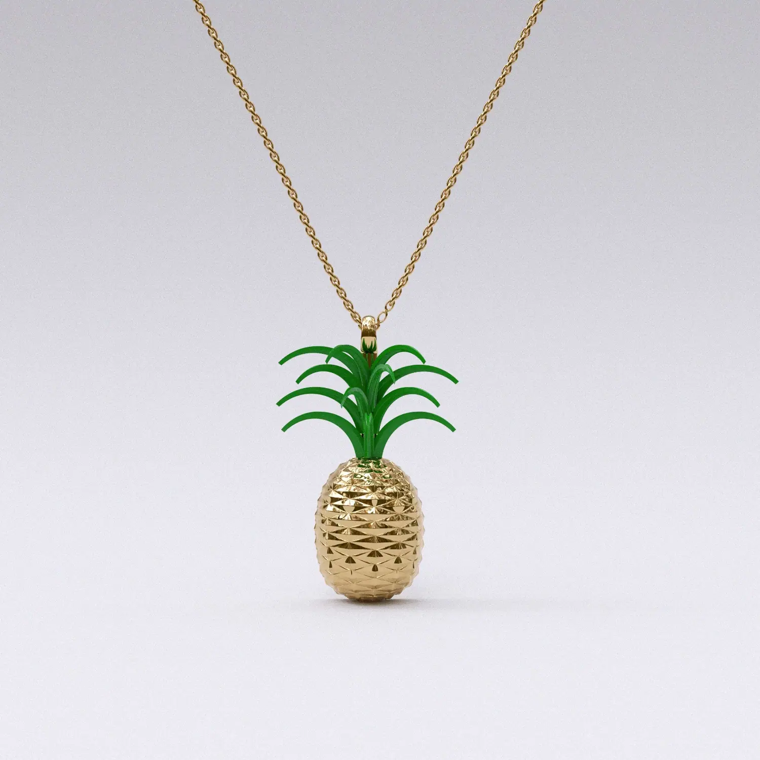 Pineapple pendant with green enamel crown