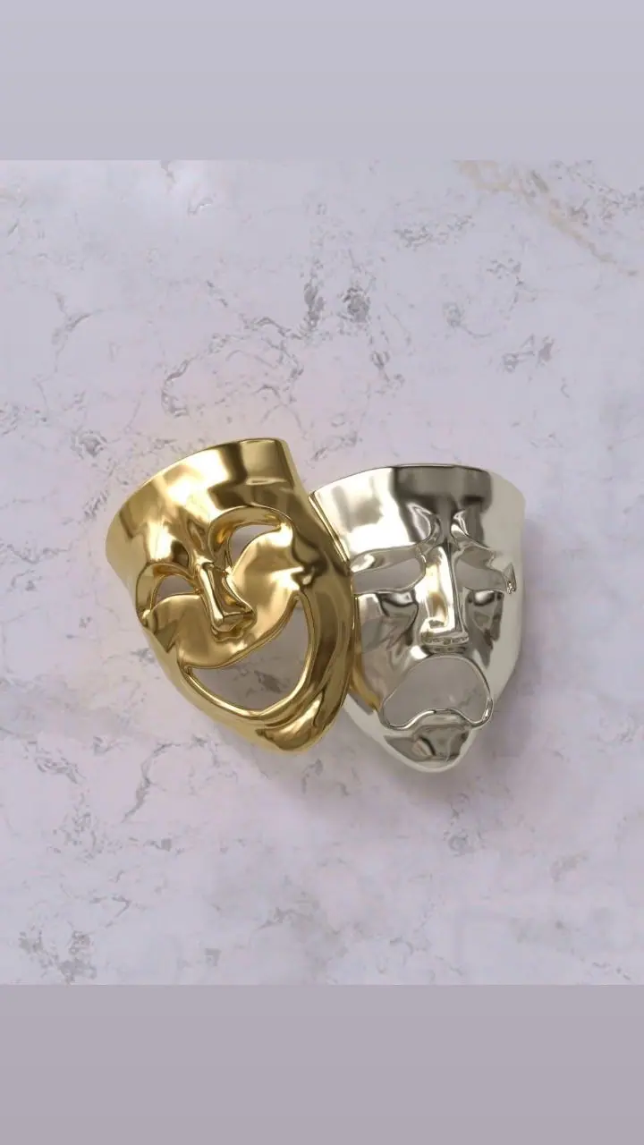 Render of the Comedy and Tragedy masks in gold and white metal