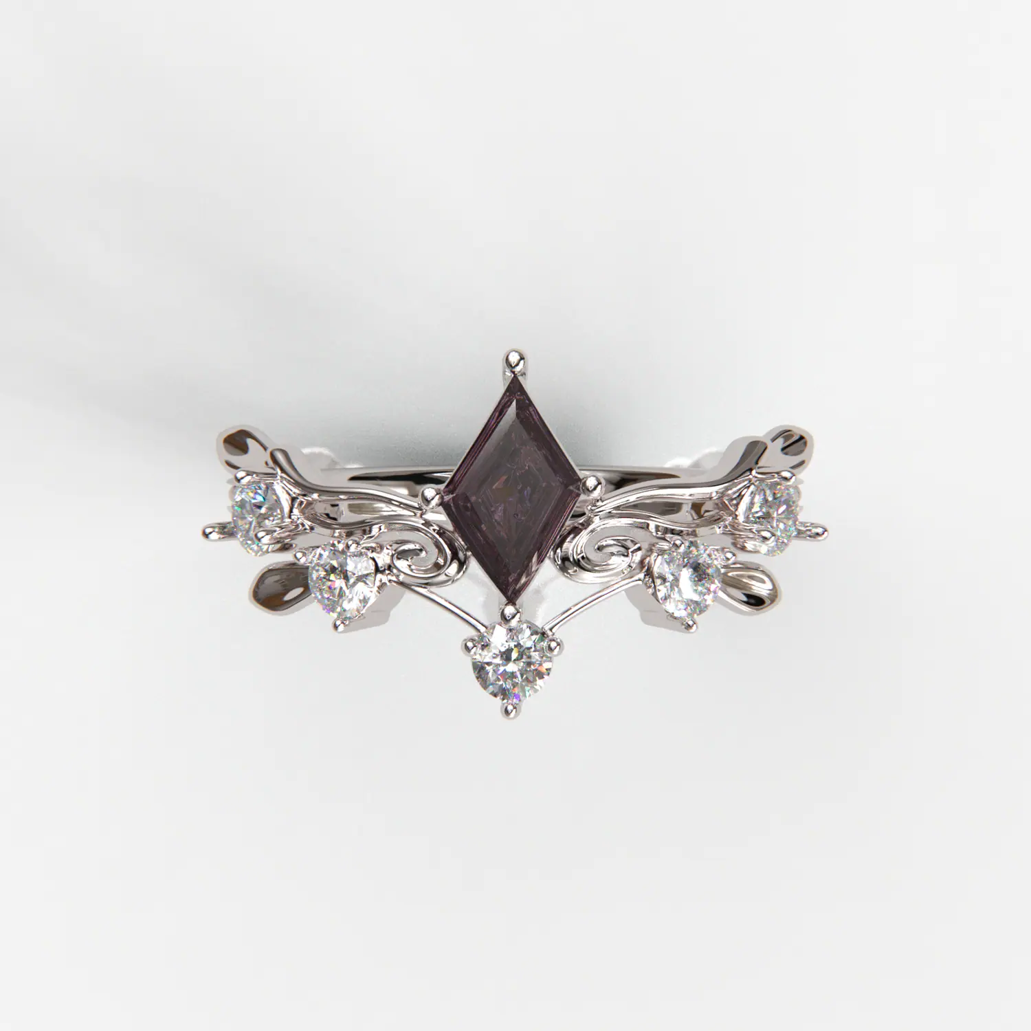 White gold floral ring with a kite-shaped stone