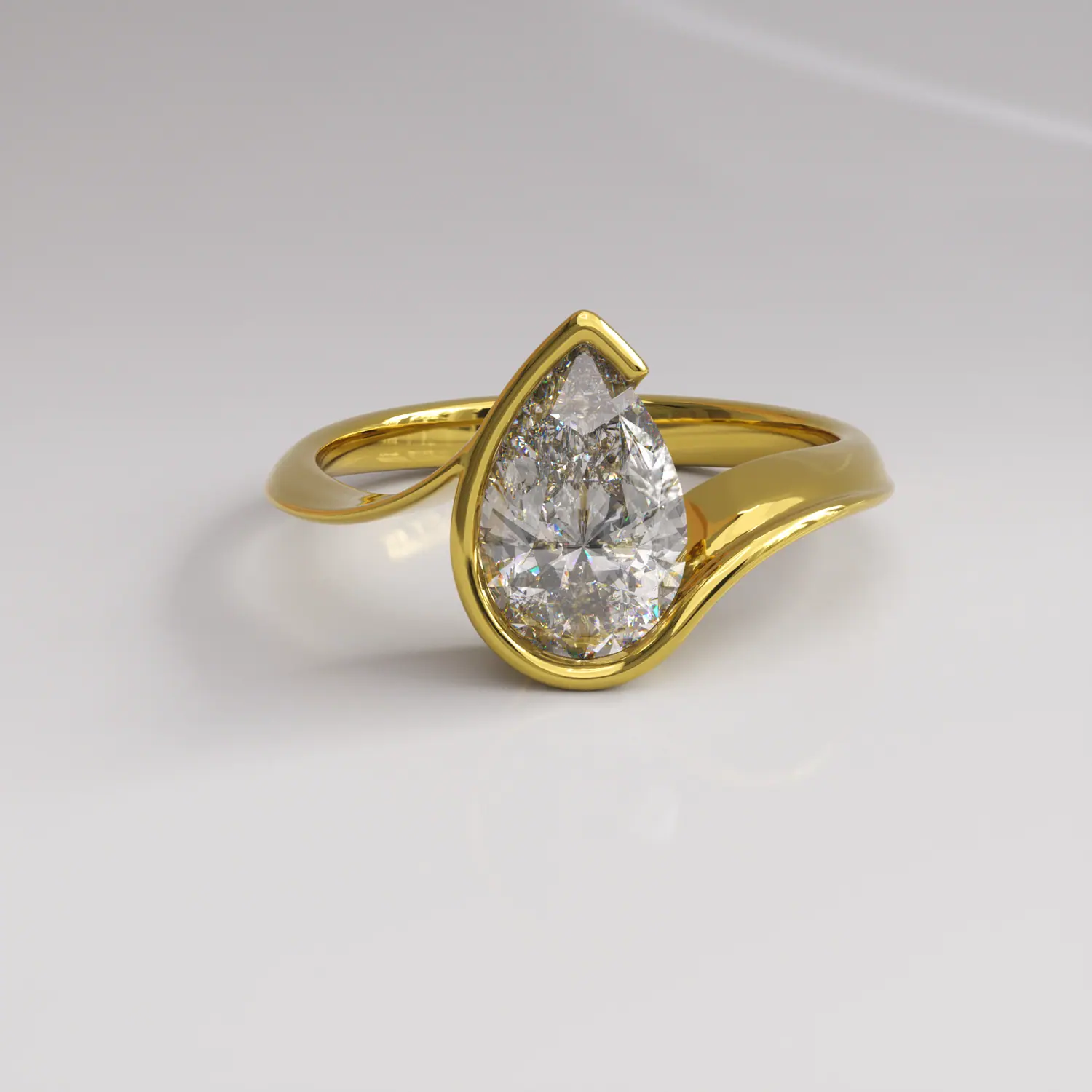 Gold bypass ring with a pear-cut diamond