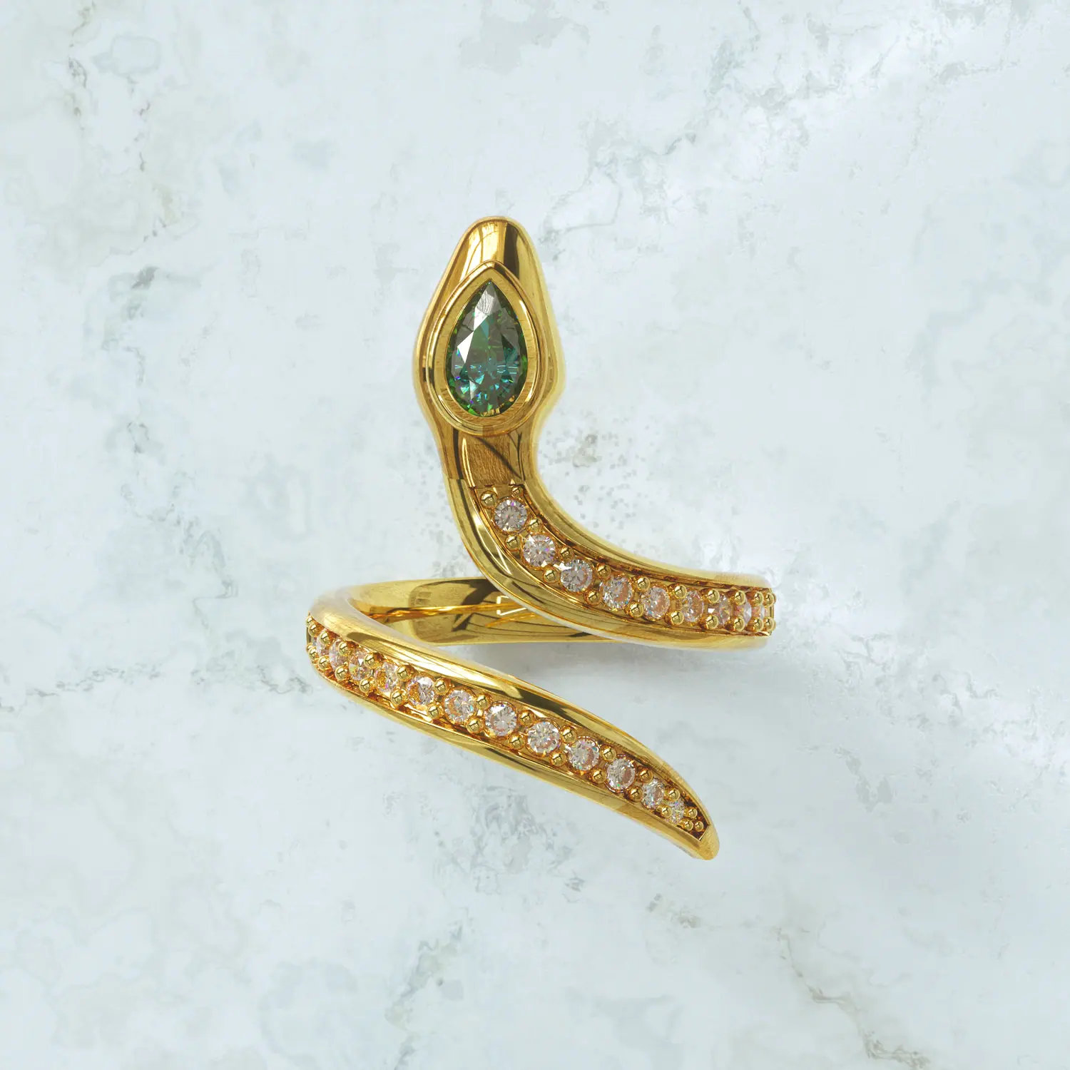 Gold serpent ring with a green stone and pave body